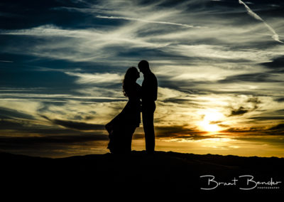 silhouette of couple algodones dunes brant bender photography