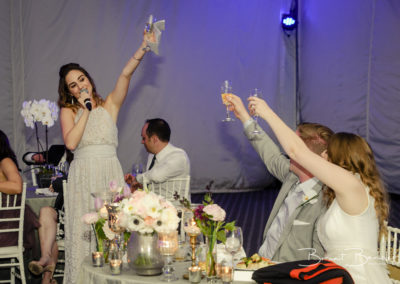 bridesmaid making a toast brant bender photography