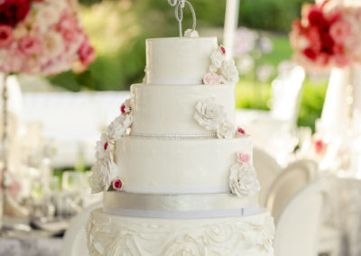 pink red and white wedding cake