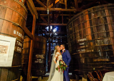 bride and groom picture in winery