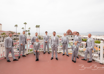 cool creative groomsmen photo on balcony hotel del