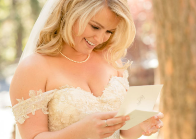 cute bride reading letter from loved one