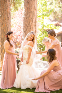 bride and bridesmaids pink orange white