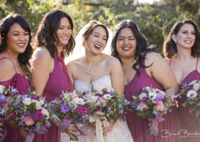 bride and bridesmaids laughing brant bender photography