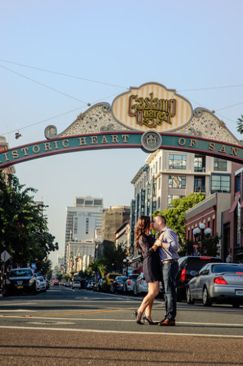 couple kissing in front of gaslamp quarter sign san diego